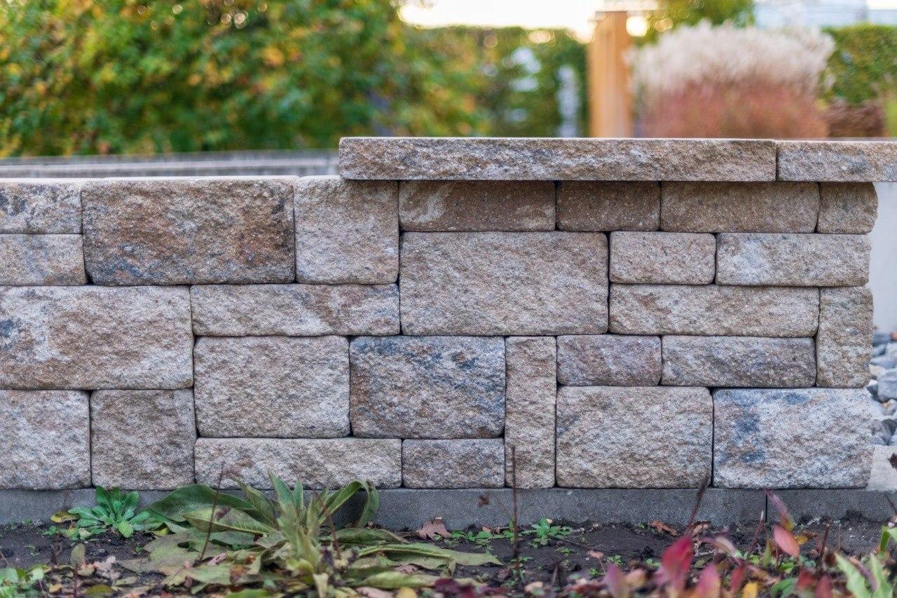 Concrete block retaining wall in Kansas City residential landscape